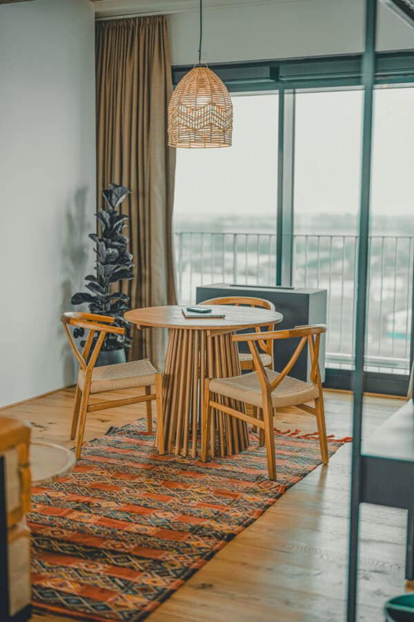 Torn Stuuv at the John & Will Hotel the private suite with bright seating area, cozy modern interior design and exclusive rooftop terrace access