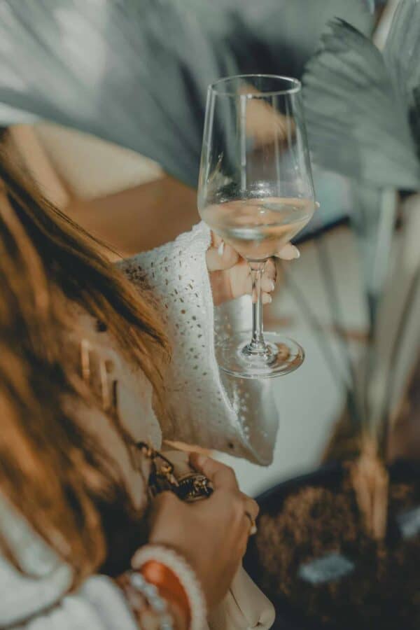 Enjoying wine at the John & Will sustainable hotel bar by the Weser River